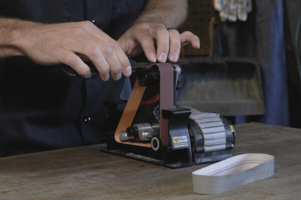 Sharpening a spear point blade